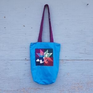 Patch & Roam sky blue patchwork small tote bag w/ raspberry red shoulder straps